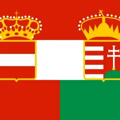 Flaga Austro-Węgier, symbolizująca historyczne powiązania z Budapesztem. Dwie korony i tarcze herbowe na czerwono-biało-zielonym tle.