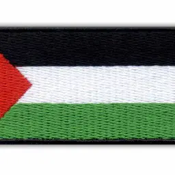 Naszywka z flagą zielono biało czarną, symbolizującą Palestyńczyków.