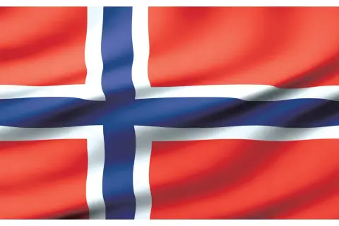 Flaga Norwegii: czerwona z białym i niebieskim krzyżem.