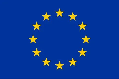 Flagi krajów europejskich tworzą okrąg złotych gwiazd na niebieskim tle. Symbol jedności i współpracy.