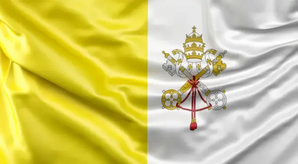 Flaga papieska z dwoma kluczami i tiarą. Dwa pionowe pasy: żółty i biały.