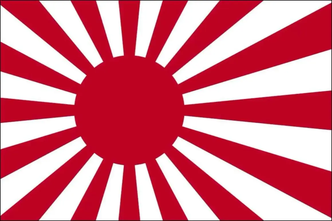 Flaga Japonii z czerwonym słońcem i promieniami.
