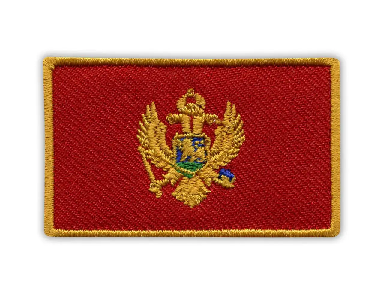 Naszywka z herbem i złotym orłem na czerwonym tle, symbolizująca flagę Czarnogóry.